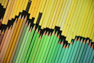 Bright colored pencils arranged neatly showcasing various hues perfect for art and design.